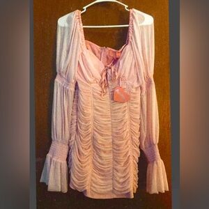 Size M Sugar Thrillz dress from Dolls Kill. sexy light pink dress, NWT!